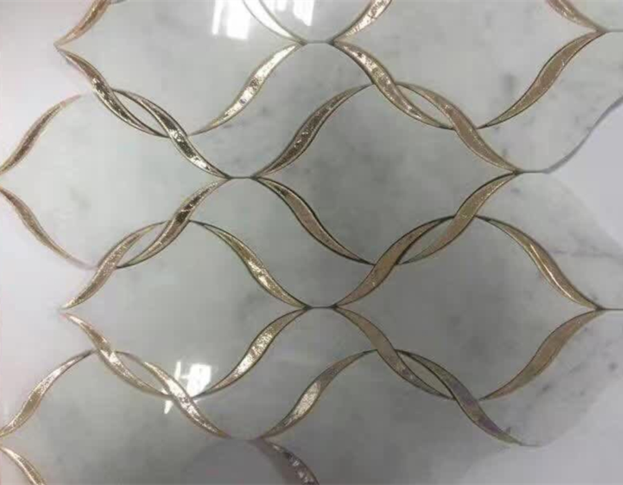 Waterjet Carrara White with golden lines 