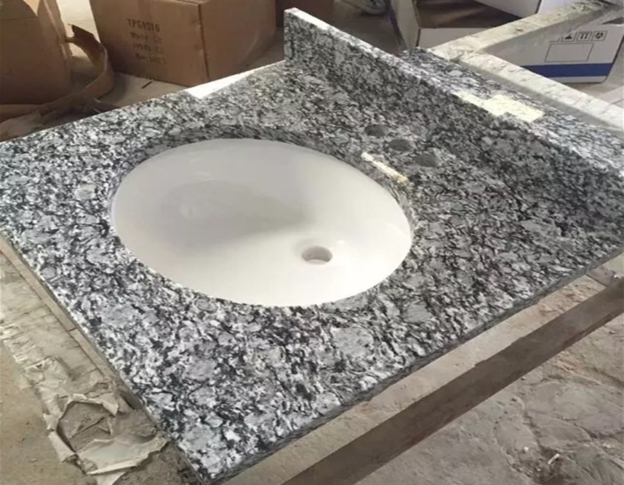 31Sea wave granite with oval sink