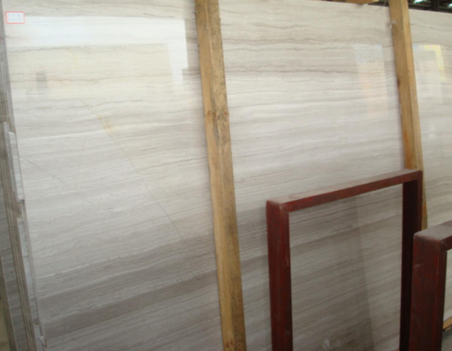white wooden vein marble slabs